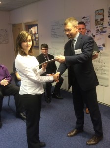 Amy receives her certificate from Exeter City Council Chief Executive